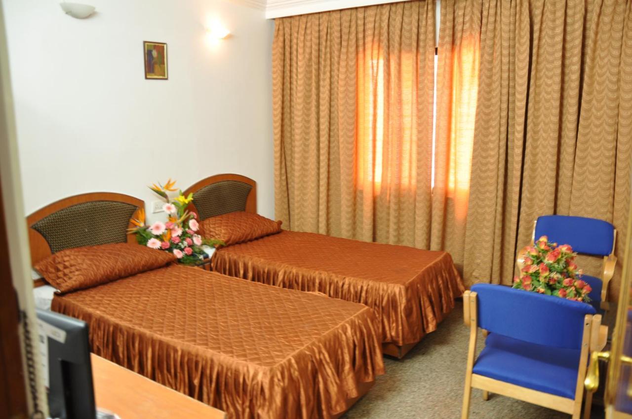 Hotelpearlinn Bangalore Bagian luar foto